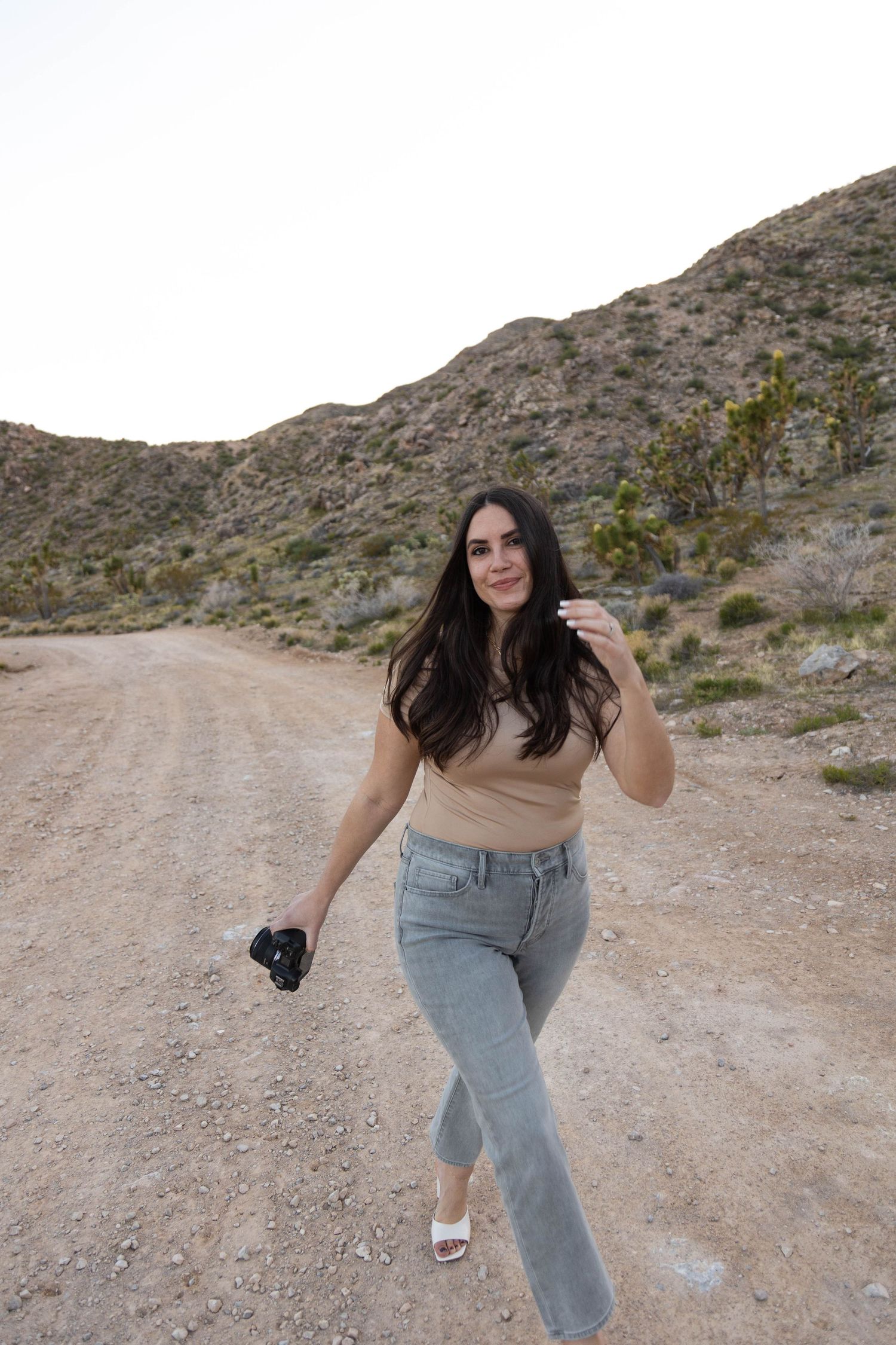 Lifestyle branding image of photographer outdoors with natural light