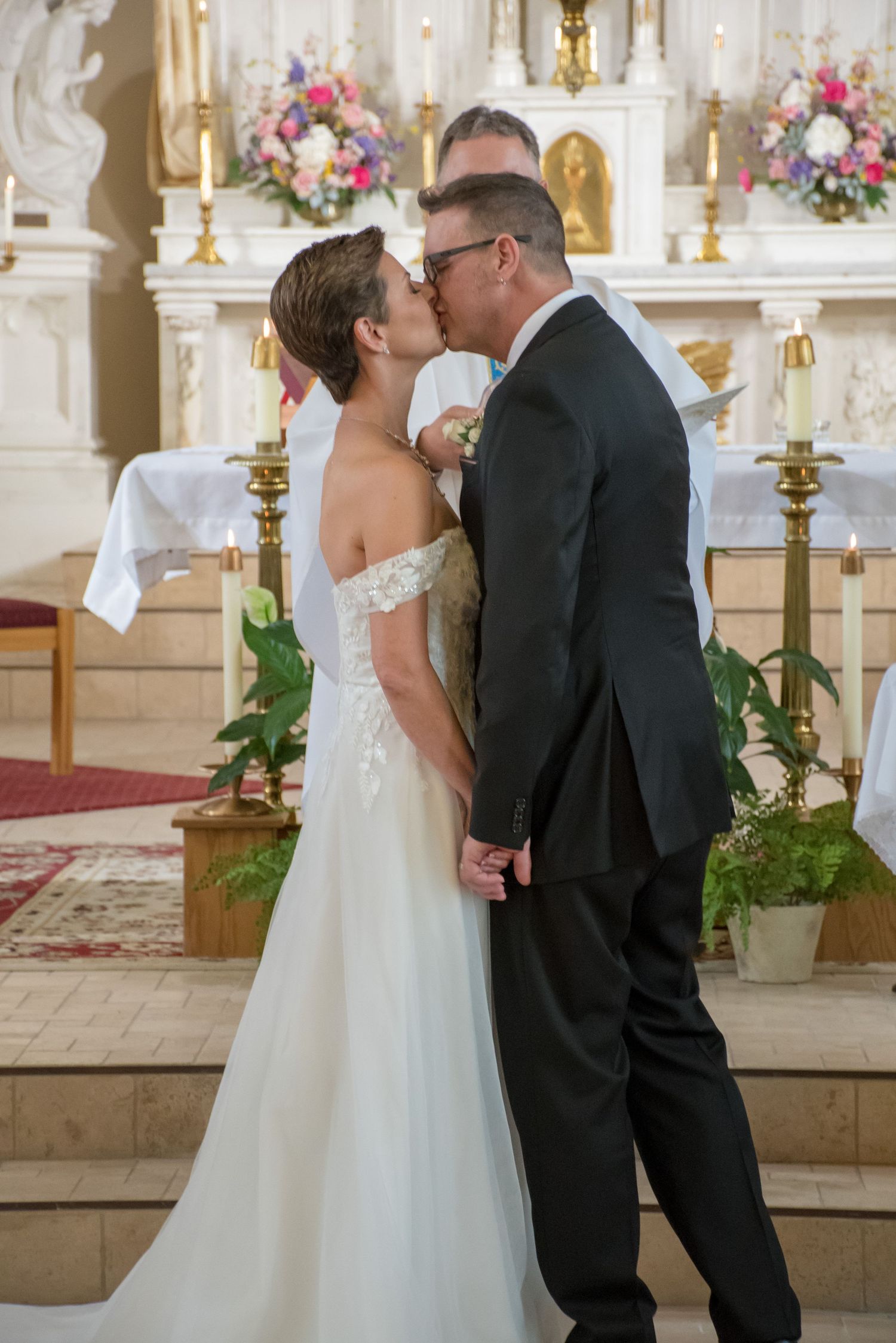You may kiss your beautiful bride.