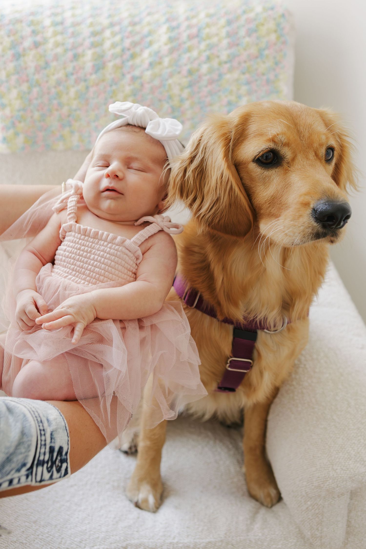 Paula Brearley, NYC family photographer, capturing a newborn in a warm, intimate home environment