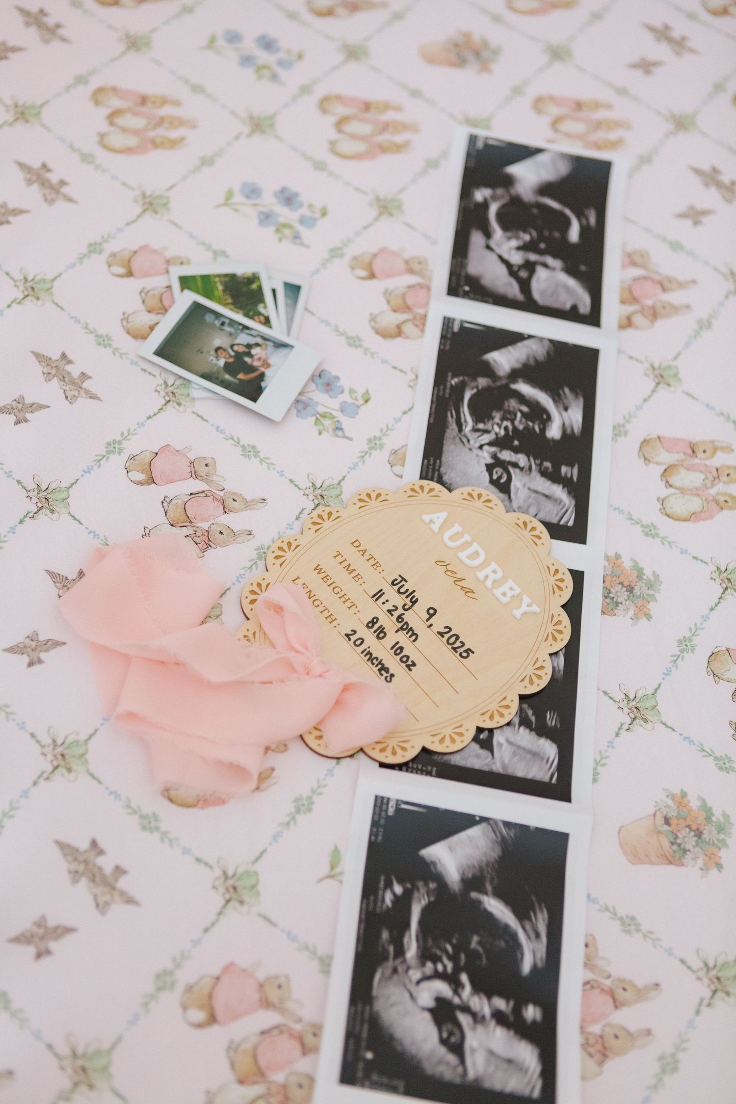 In-home newborn photography in NYC by family photographer Paula Brearley, capturing a peaceful baby in a natural light setting