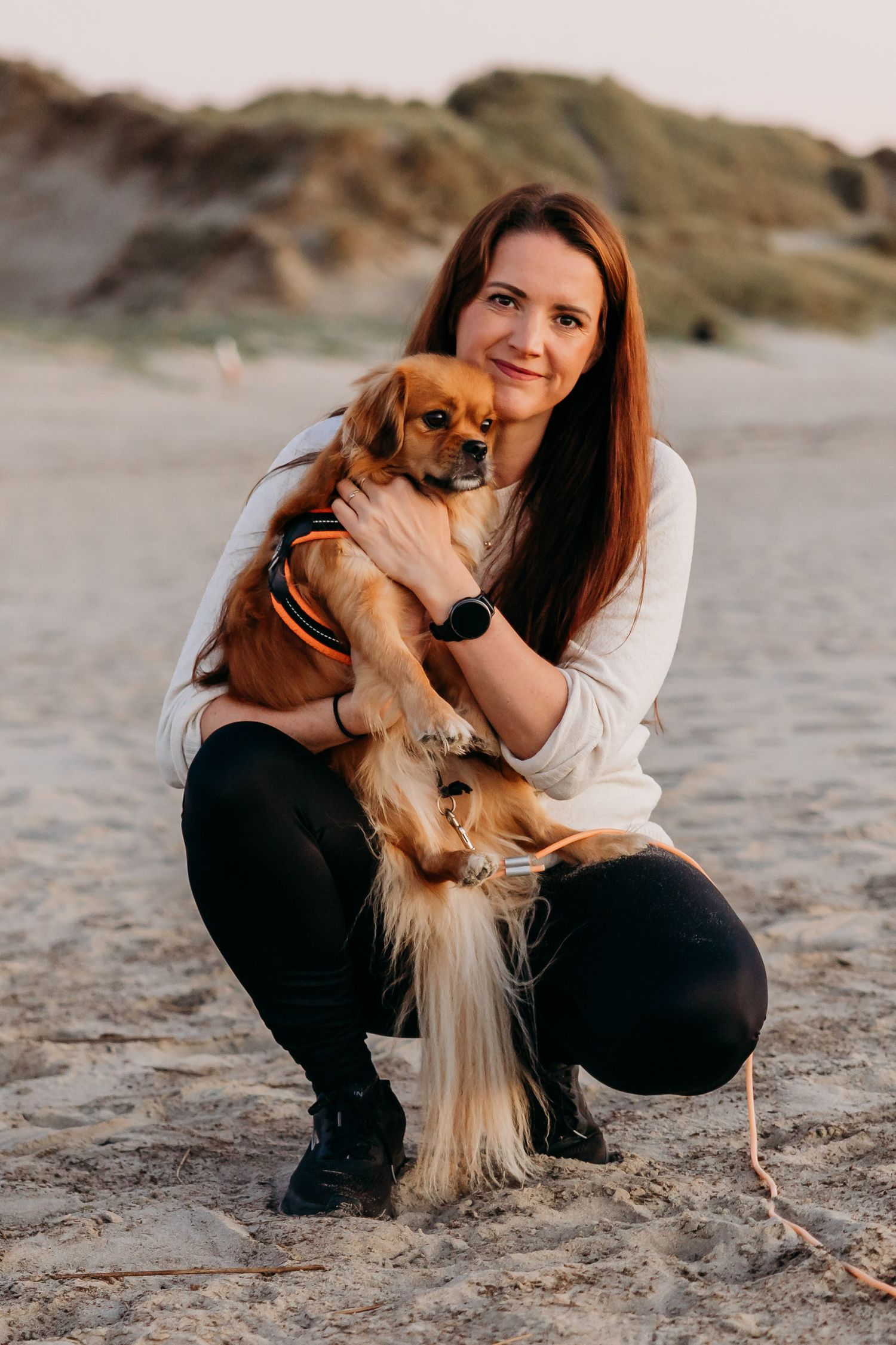 Fotograf Merete Ravndal med kamera