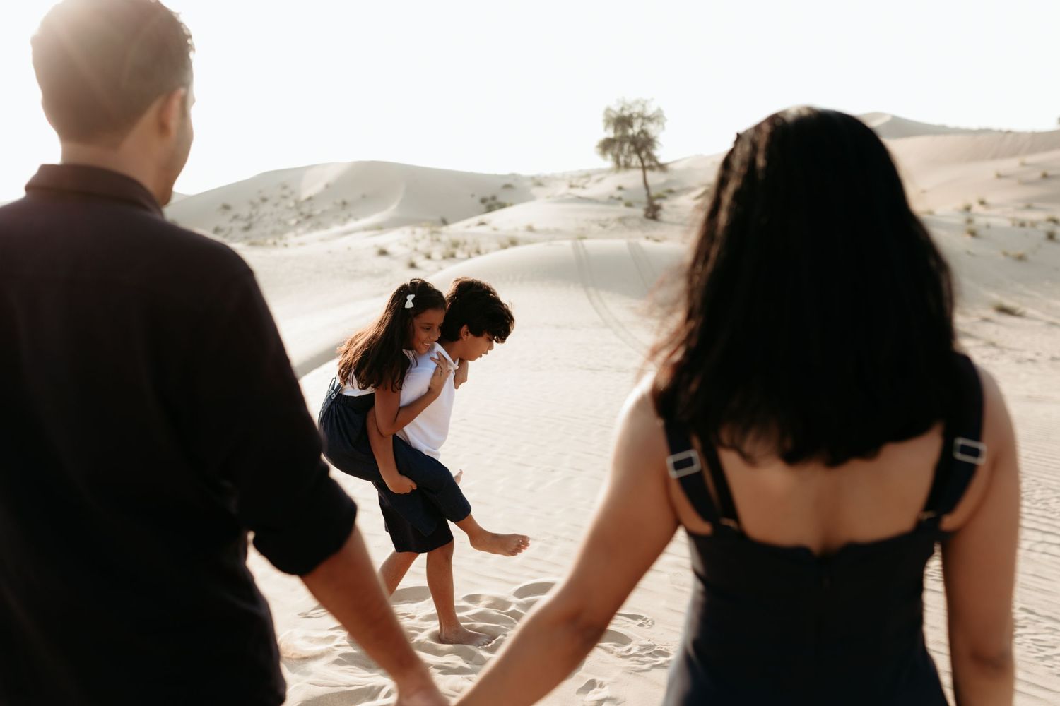 family photoshoot at the desert natural light golden hour in abu dhabi lifestyle