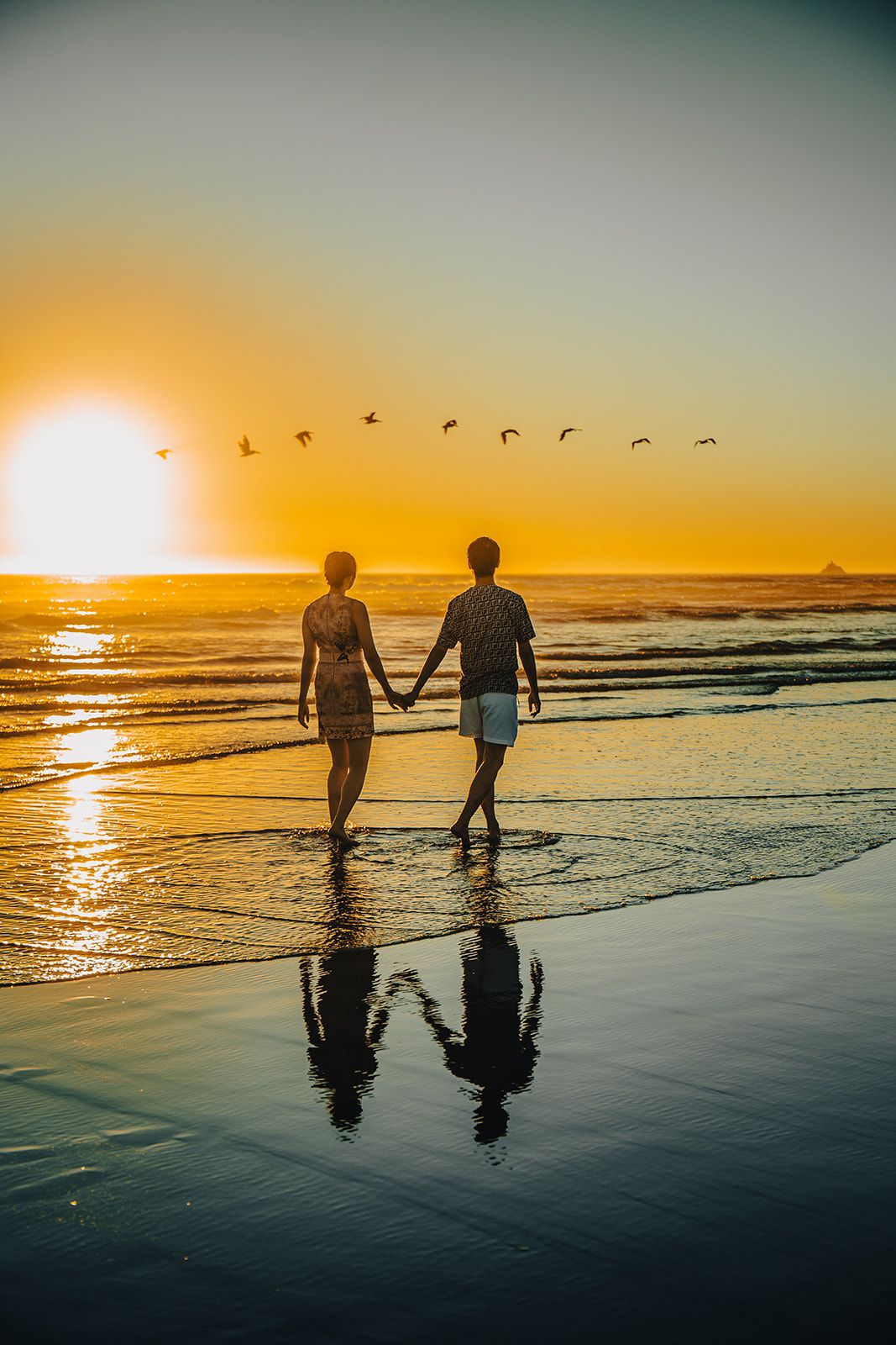 Photograph of couple enjoying scenic coastal view taken by Oregon Coast Photographer.