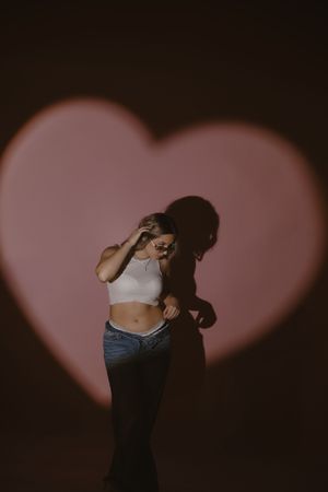 pink, studio, heart, model Editorial storytelling photography by Sydney Romero, Central Texas visual storyteller
