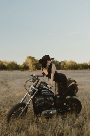 model, motorcycle, western, grunge, harley Storytelling photography capturing natural connection by Sydney Romero, La Grange TX photographer
