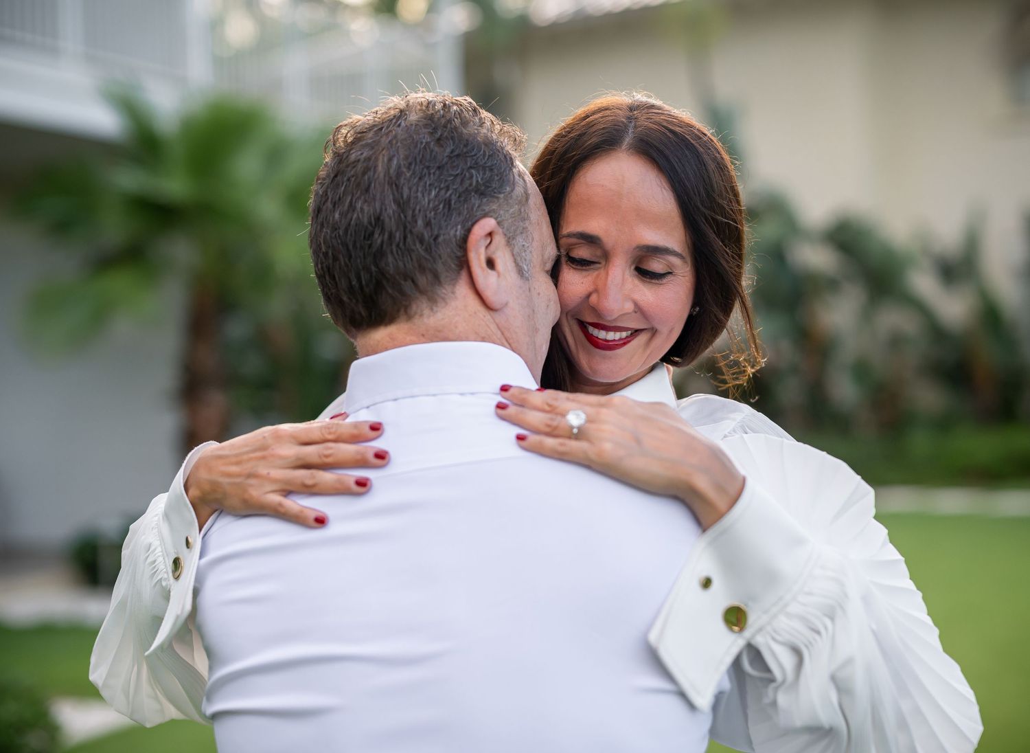 Romantic couple sharing tender hugs and laughter in a series of intimate outdoor moments.
