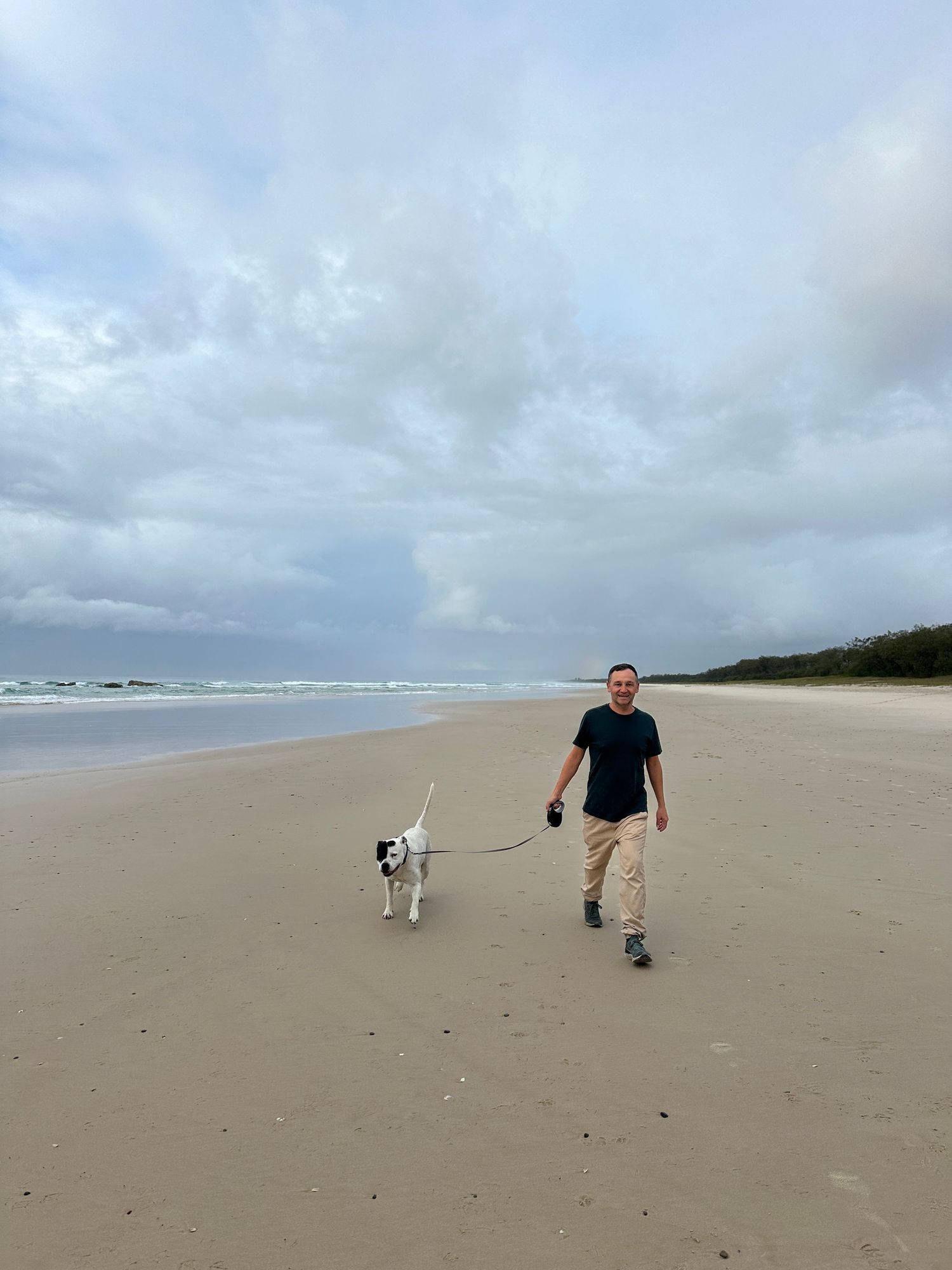 Laurence walking a dog.