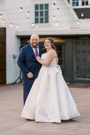 A sequence of wedding photos capturing a couple dancing under string lights on a white stone patio.
