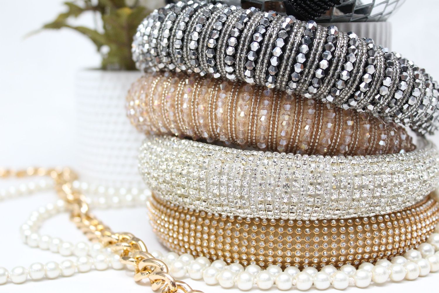 Elegant stacked crystal and rhinestone bracelets in metallic, gold and silver tones. Perth WA Photo booth Hire Event Booth