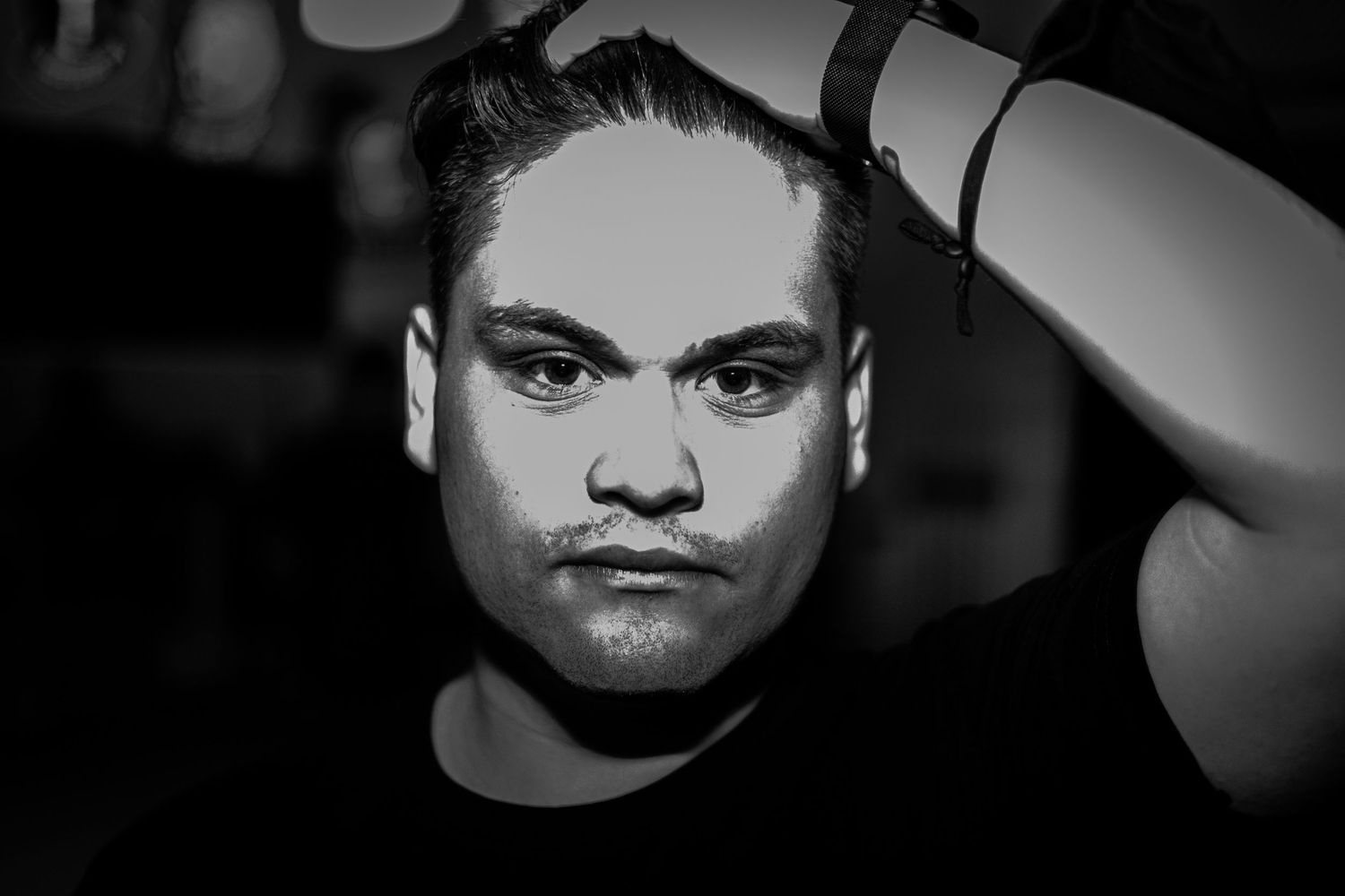 Black and White Photo of Diego at his first band appearance of the Usual Suspects at Eagle Bar.