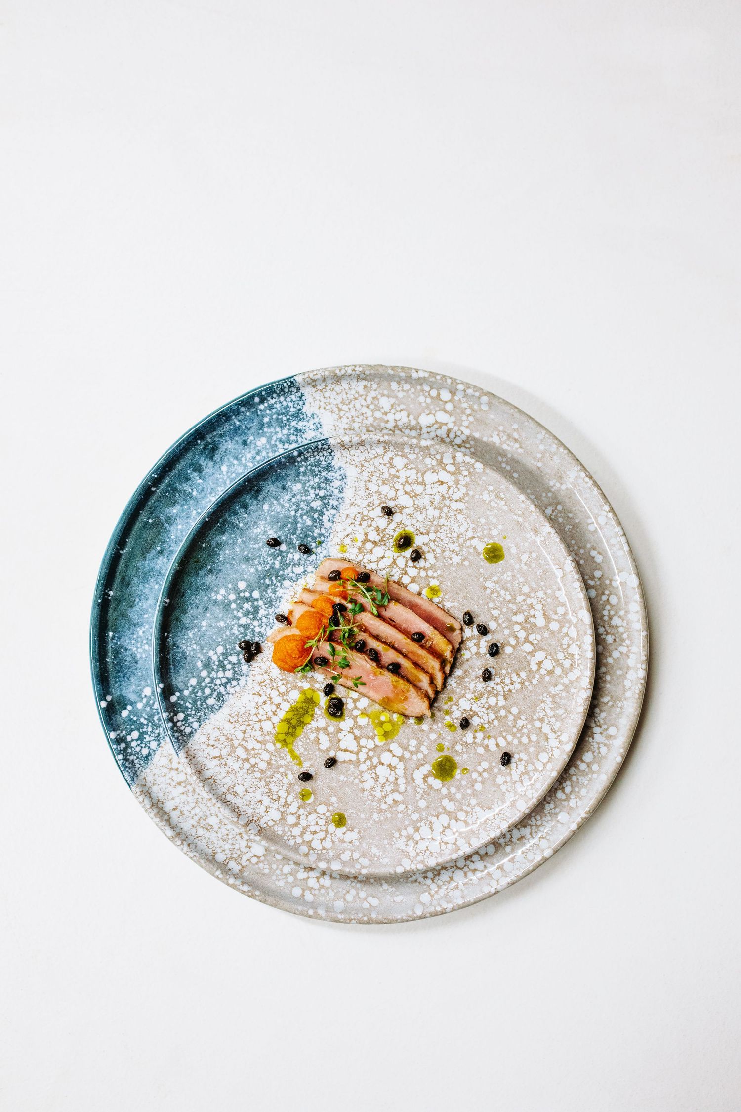 Porcelain with digital print featuring a speckled blue and beige design, creating a modern look.