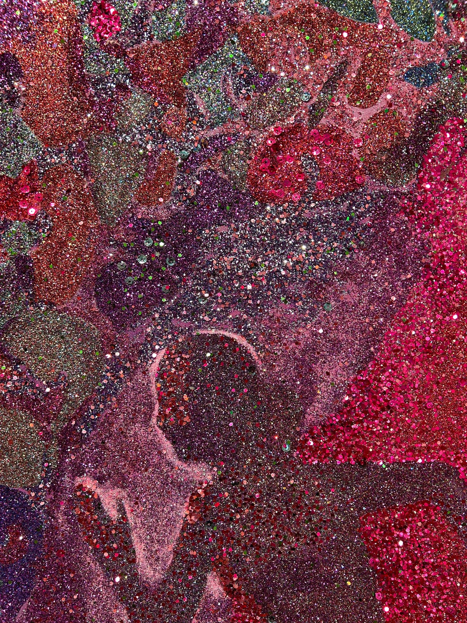 Abstract textural artwork made by glitter and sequins featuring deep red and purple tones with a speckled, cosmic-like appearance.