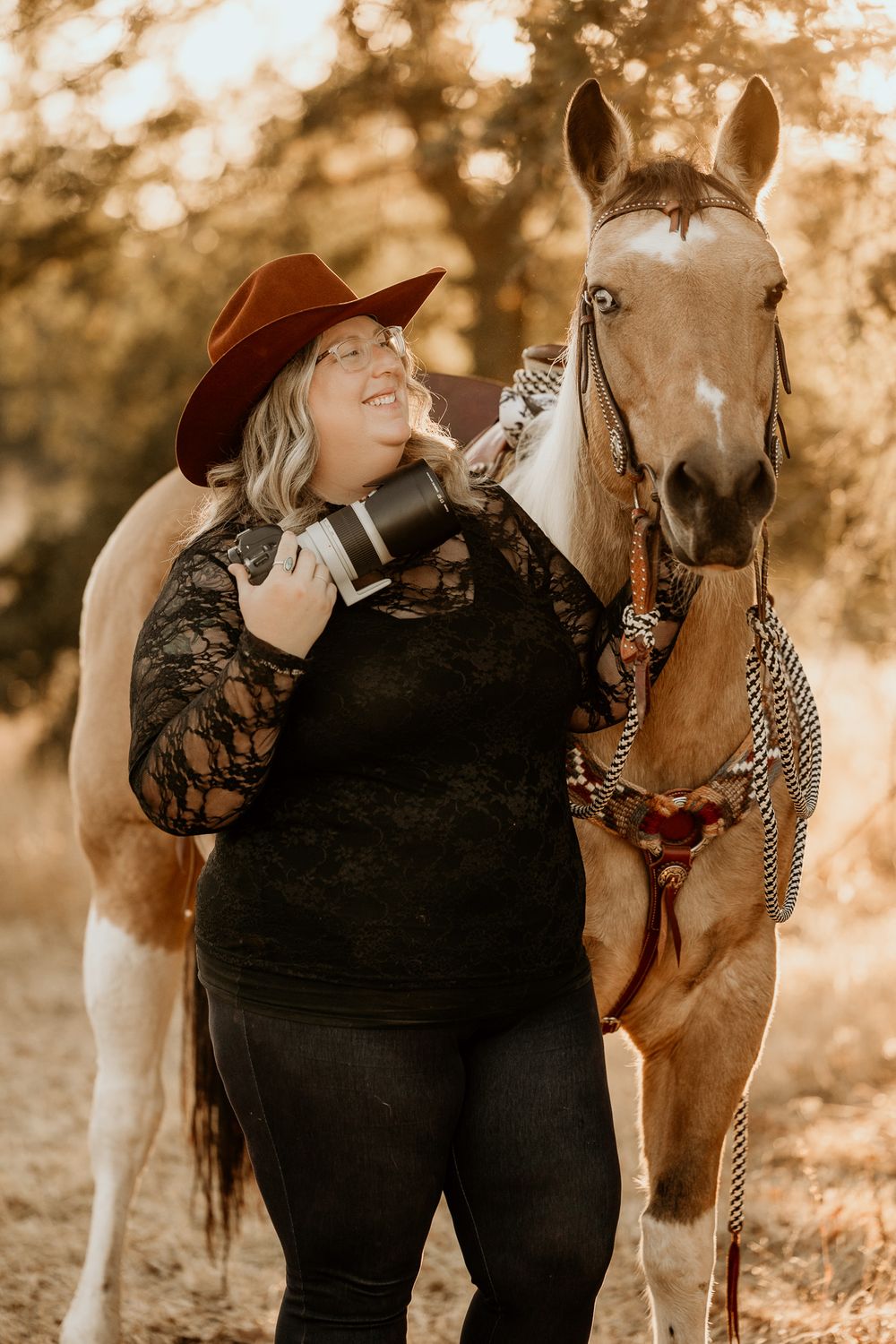 A tender moment between a horse and its companion in warm sepia tones.