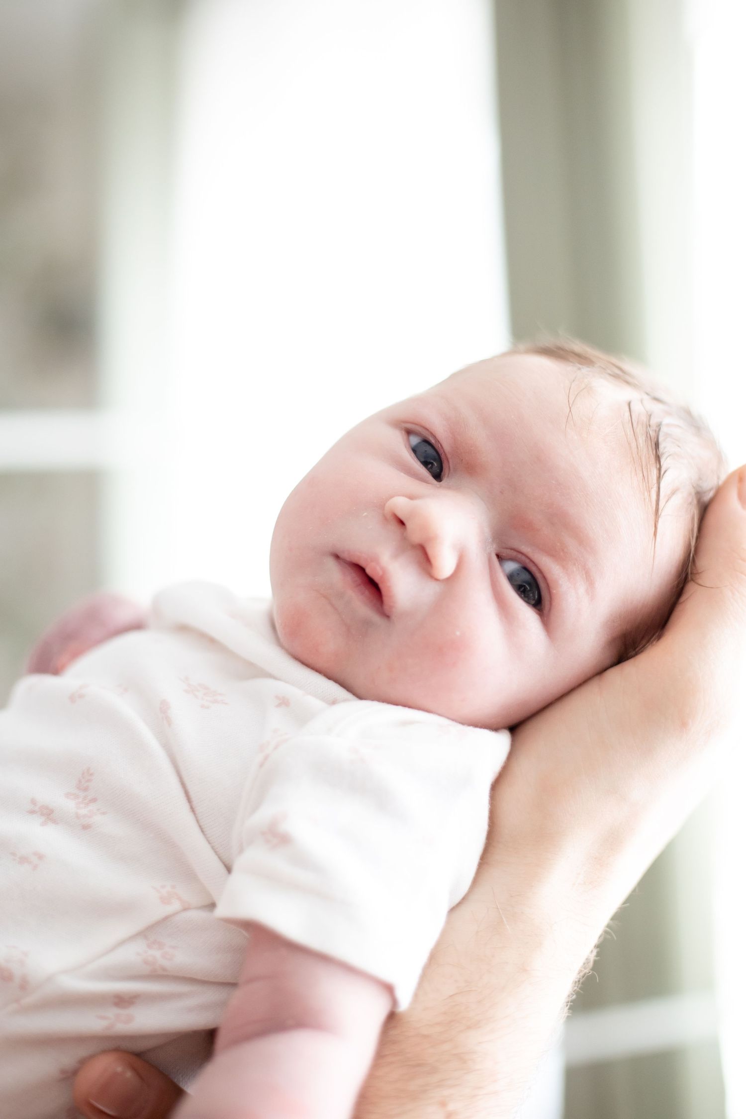newborn baby girl close up portrait