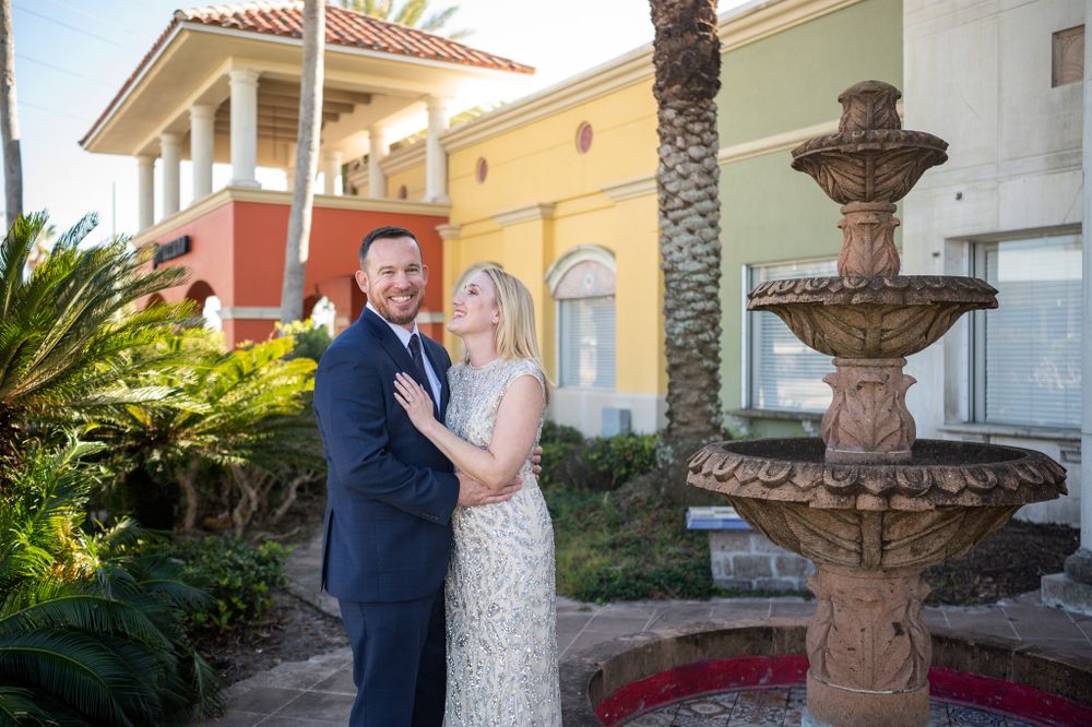Couple just married elopement wedding session photoshoot by fountain bride and groom Palm Bay Melbourne Cocoa Beach Florida Brevard County