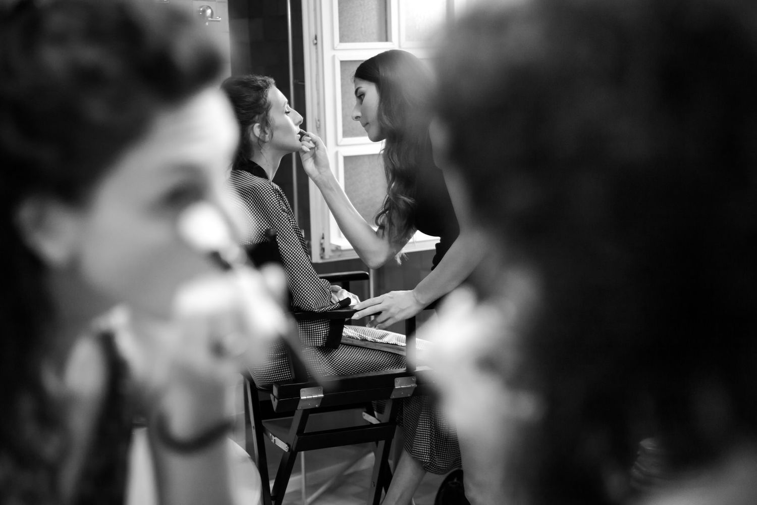 Black and white candid shots capturing natural moments during a social gathering.