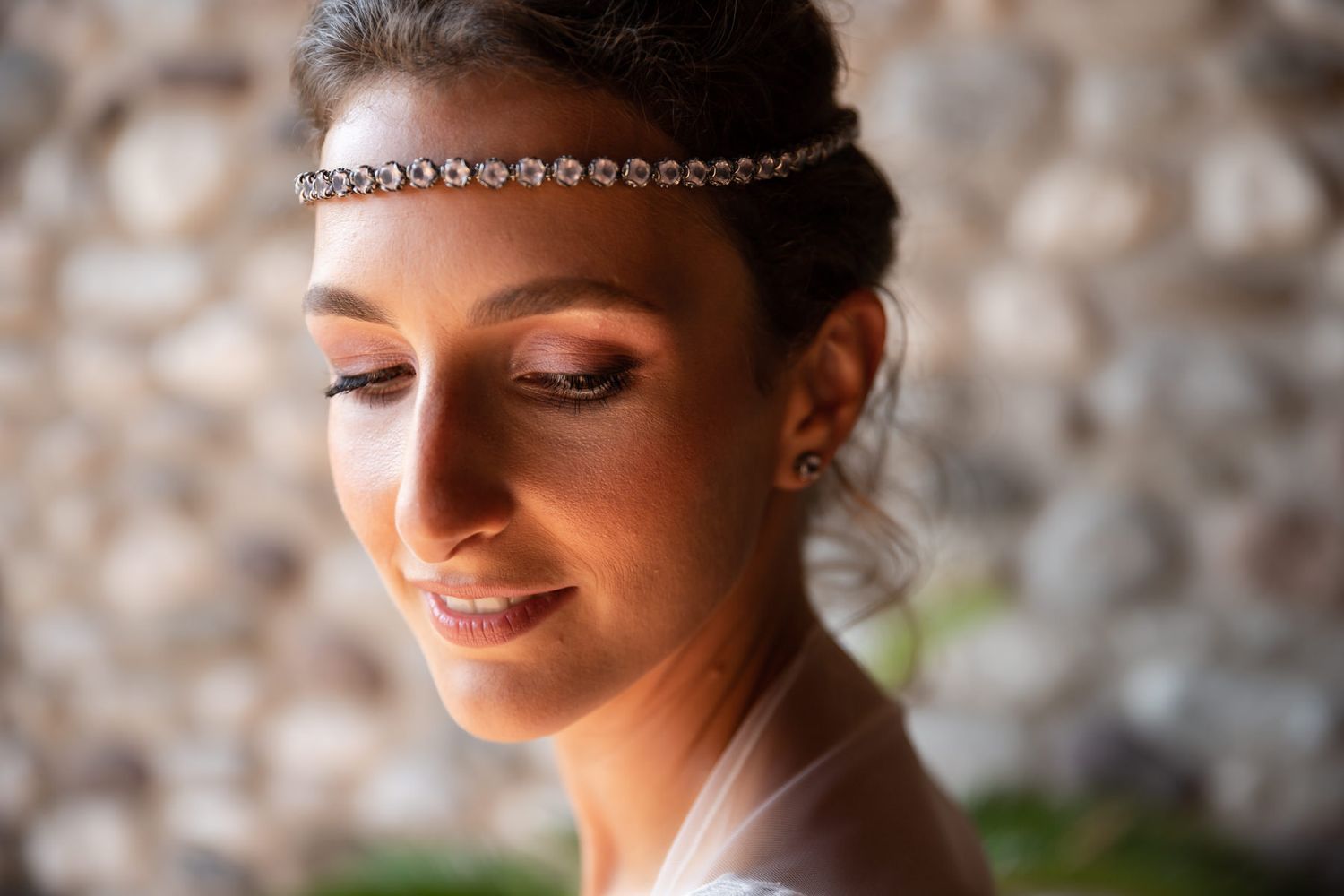 Close-up detail shots of bridal accessories and jewelry against a textured background.
