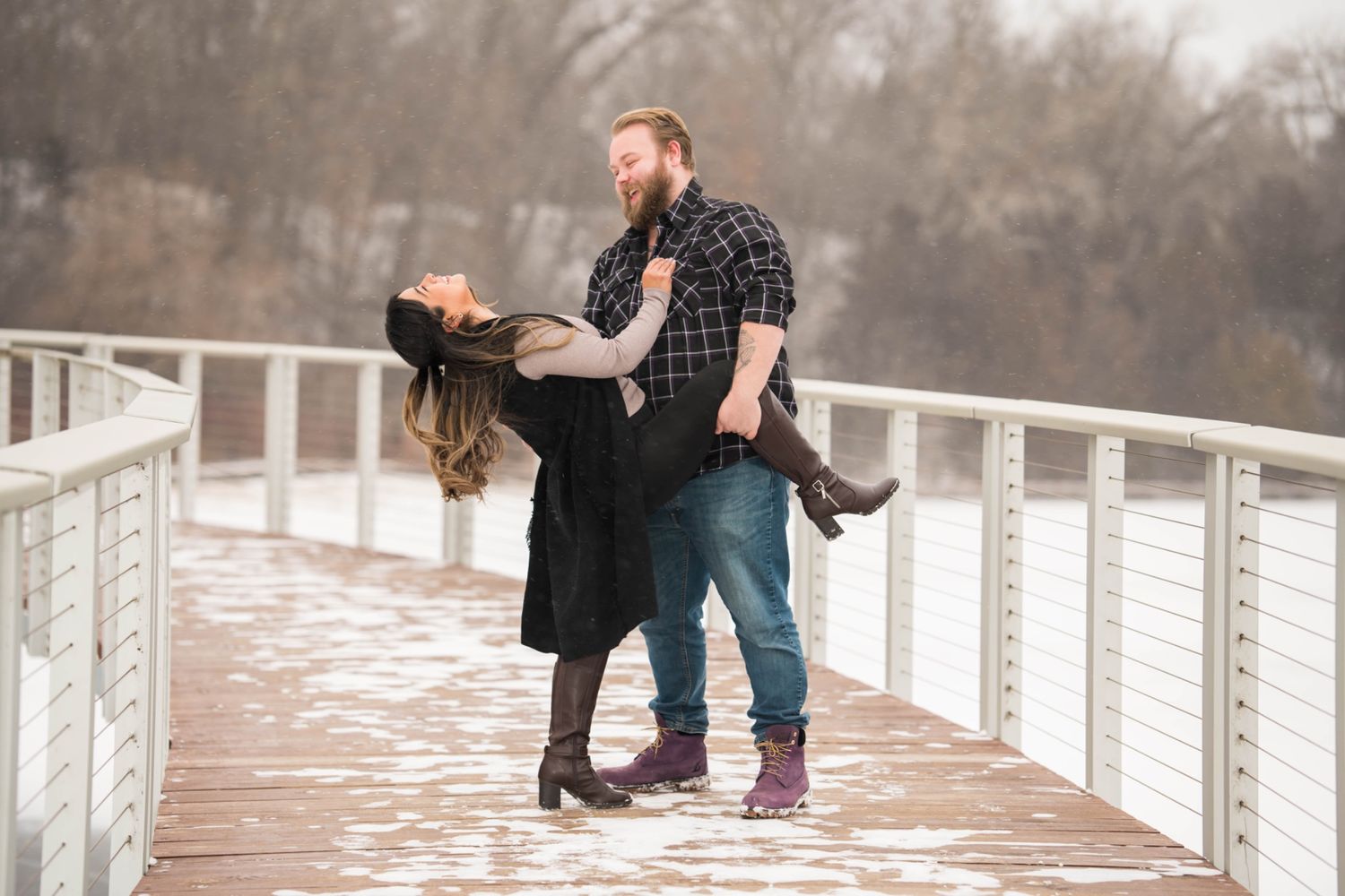 A sweet kiss shared between the couple, expressing their love and affection.