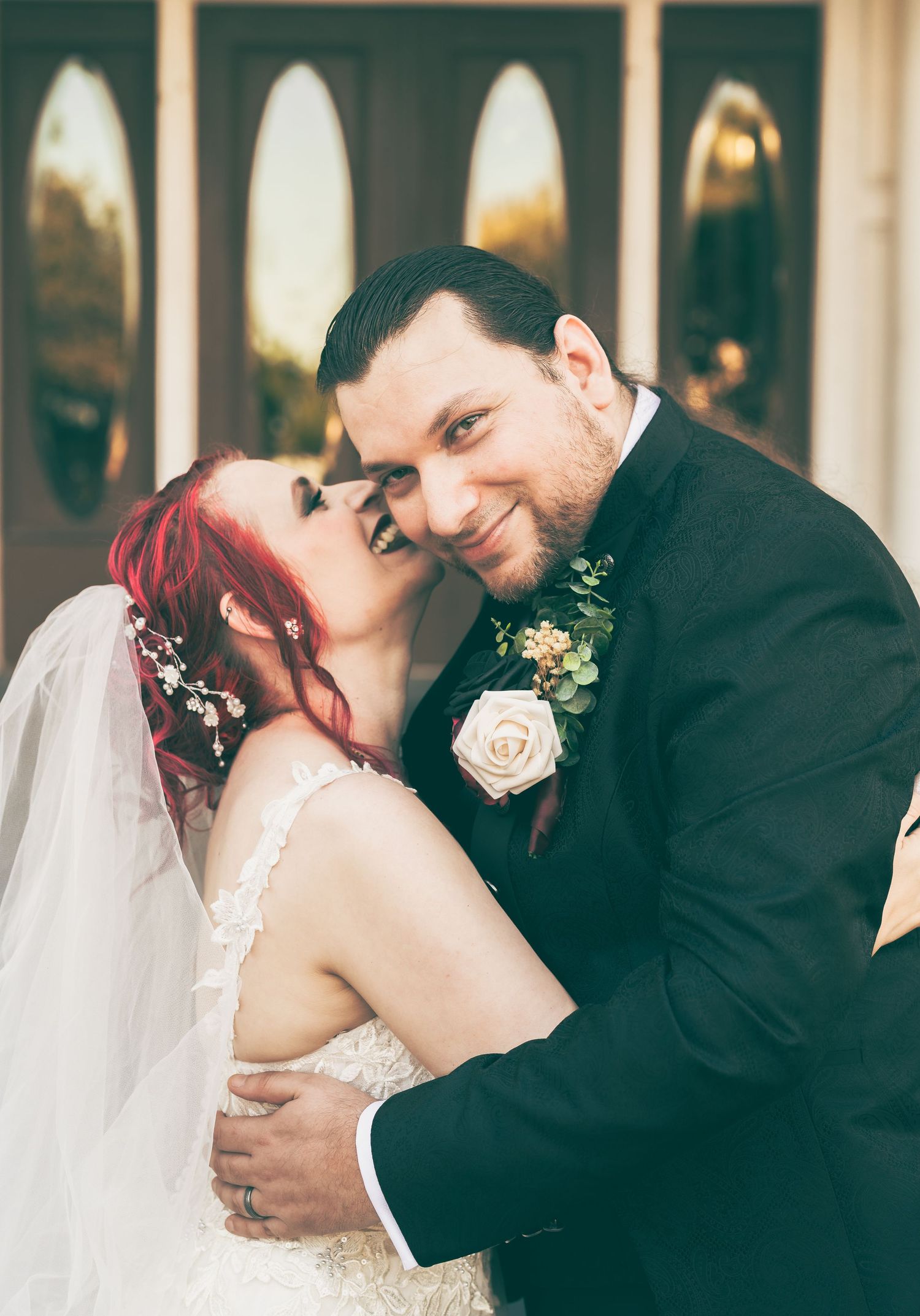Bride, whispering sweet, nothings into grooms ear in Corpus Christi, Texas