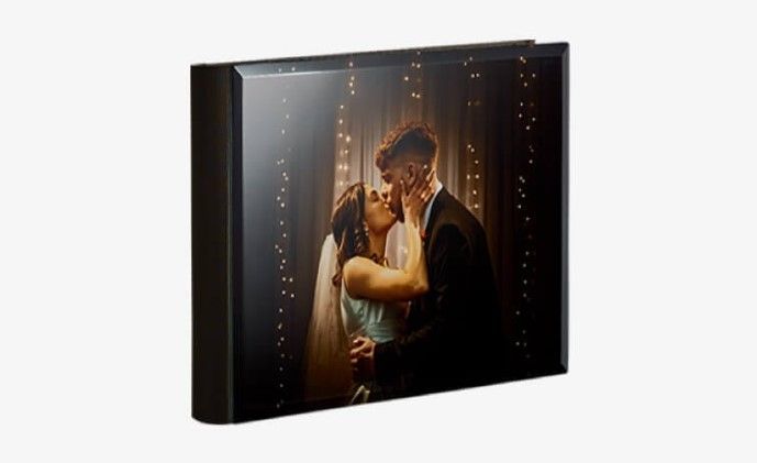 Close-up of a high-quality crystal cover on a photo album, showcasing its glossy and smooth finish