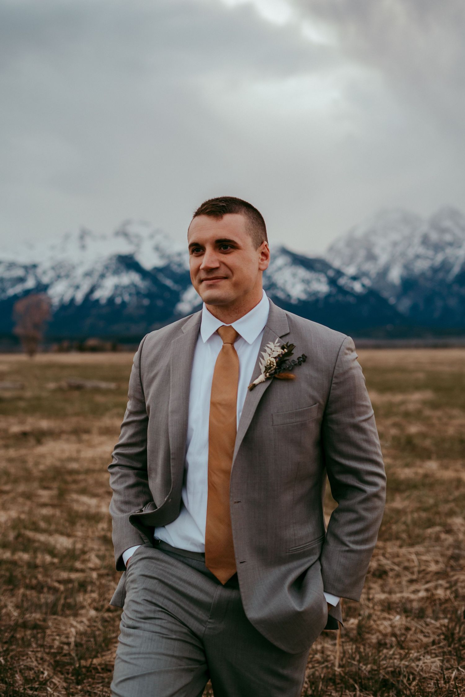 Outdoor wedding ceremony in Wyoming with mountain views and rustic charm