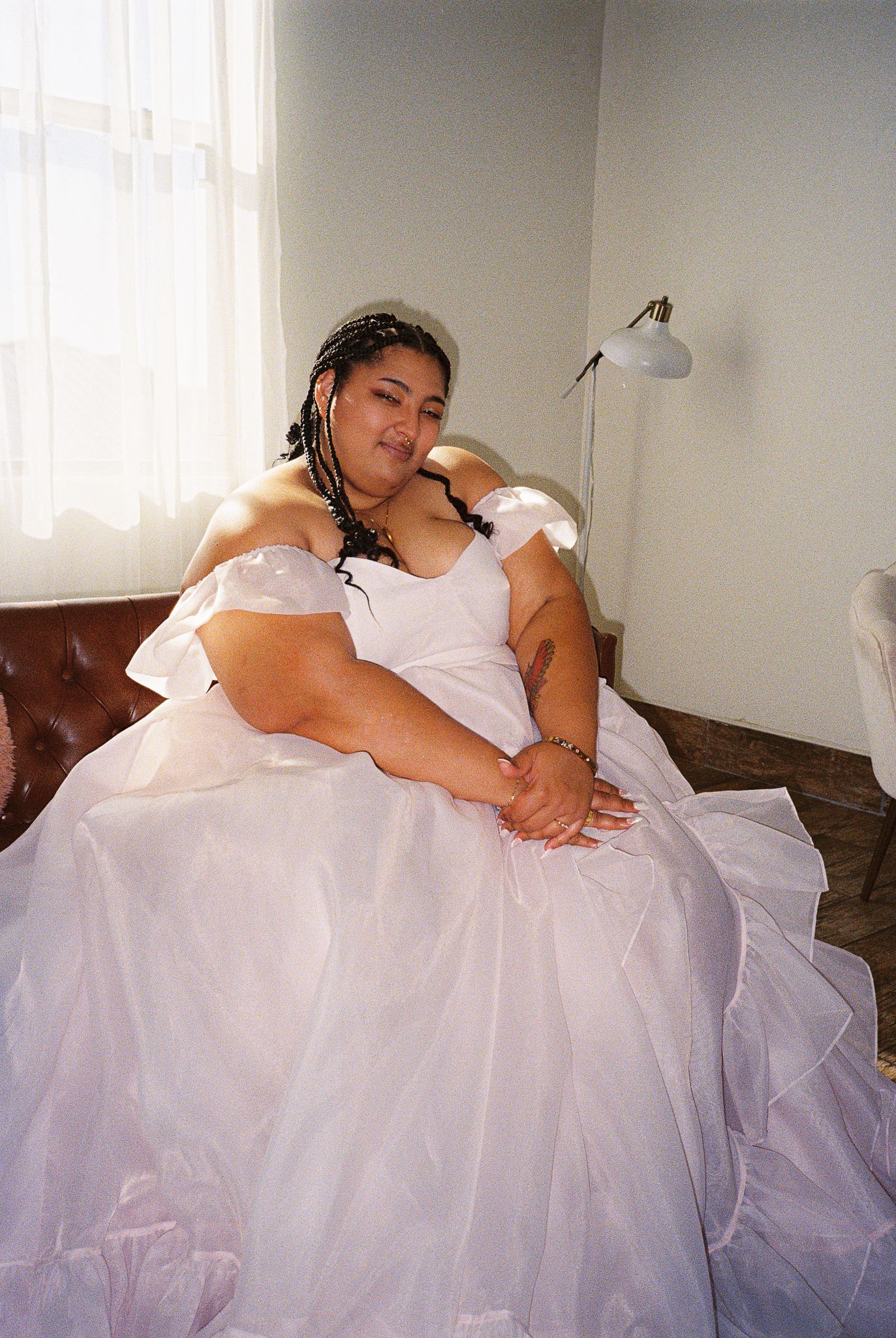 Wedding dress portrait in natural window light.