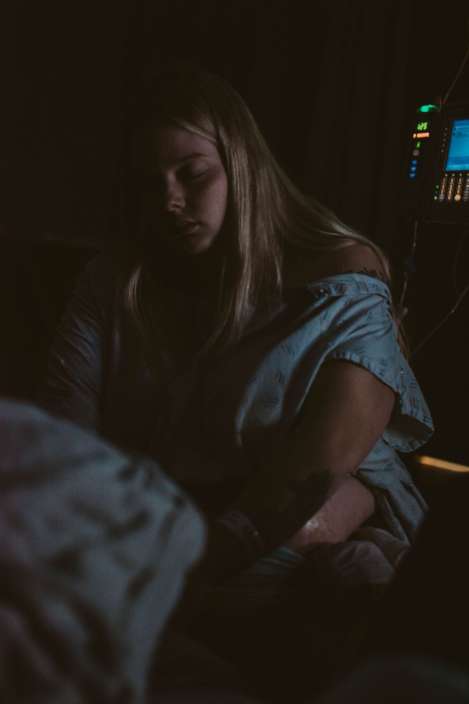 Dark interior of medical room with subtle lighting.