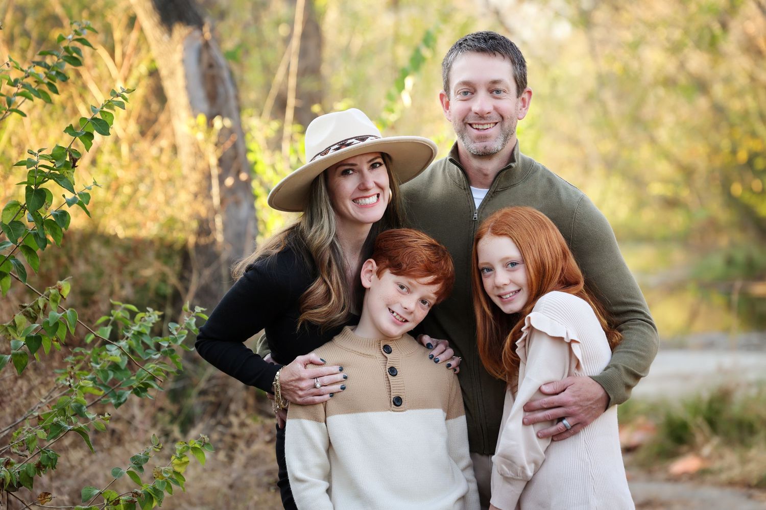 Fall family portrait outdoors with autumn colors and natural lighting in Downtown Nolensville.