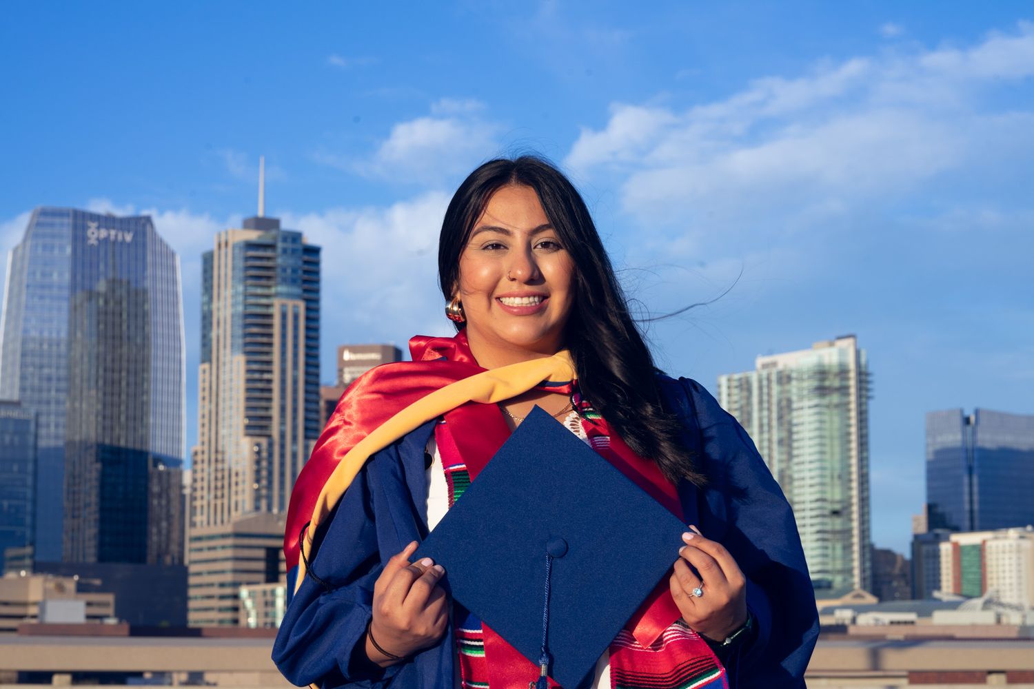 Colorado Graduate Photo near Denver Skyline - Captured By KamaraImages