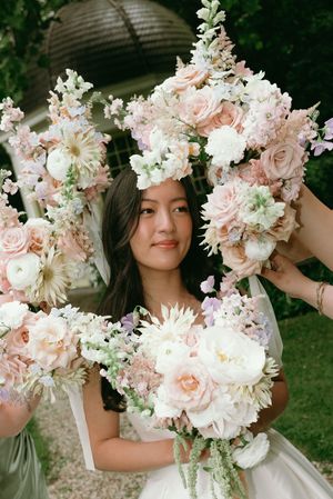 Delicate pink and white floral bouquets with roses and seasonal blooms.