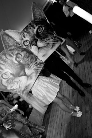 Black and white dance floor sequence with dramatic lighting and movement.