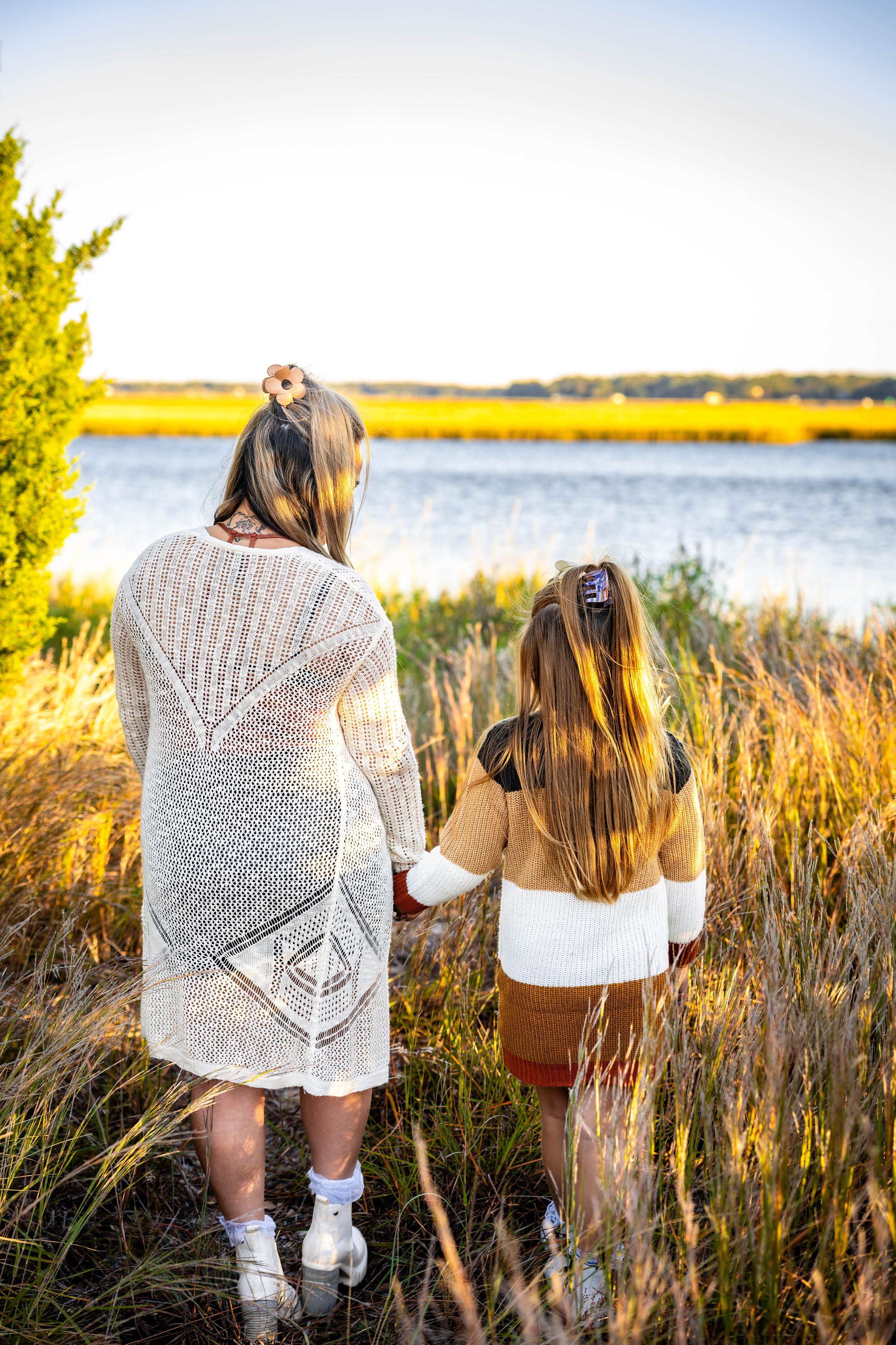 Mother and Daughter photographed looking at the water at the Brock Environmental Center
