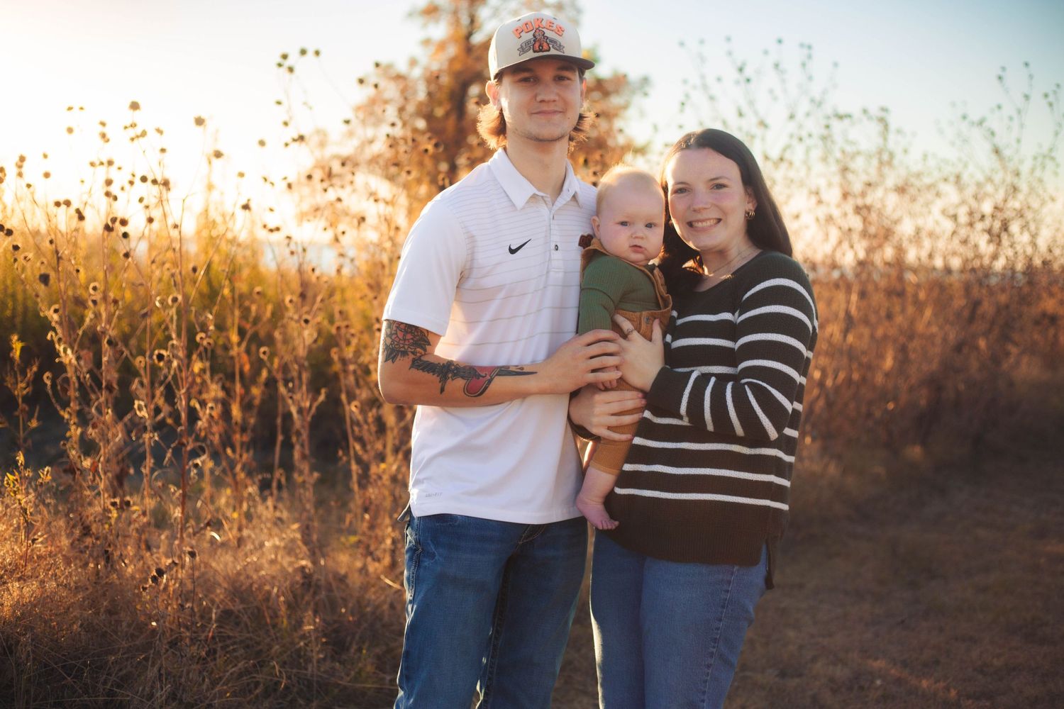 Mom and toddler cuddling during lifestyle family session in Oklahoma City