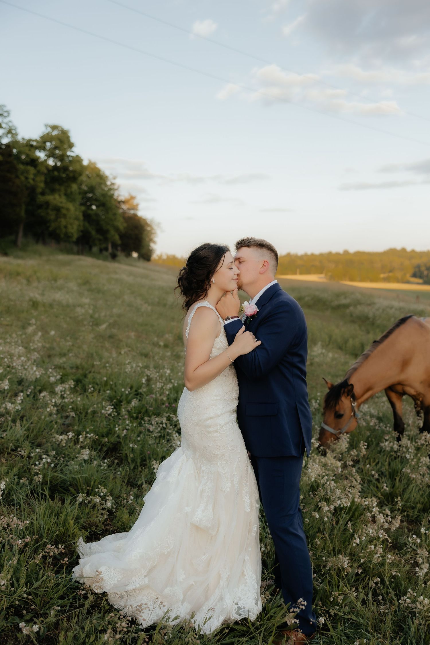 A sequence of black and white wedding photos showing intimate moments between a bride and groom during their ceremony.