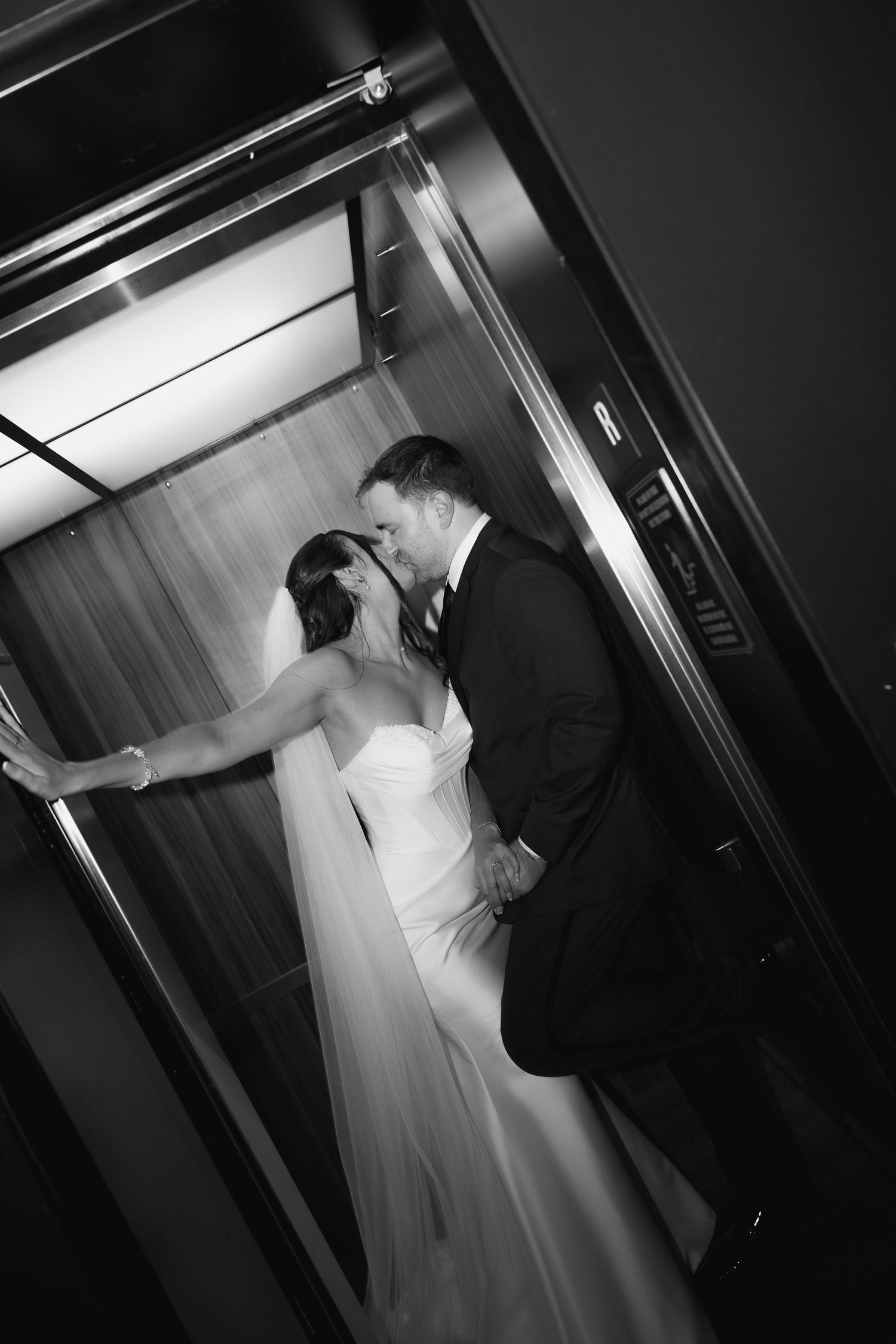 A sequence of black and white wedding photos showing intimate moments between a bride and groom during their ceremony.