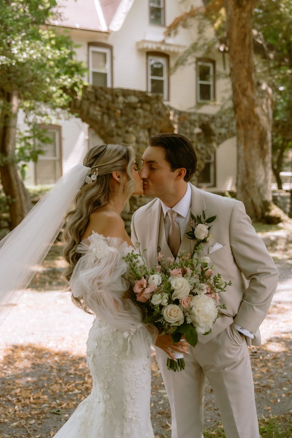 A romantic wedding sequence showing a couple sharing sweet moments outdoors with lush greenery in the background.