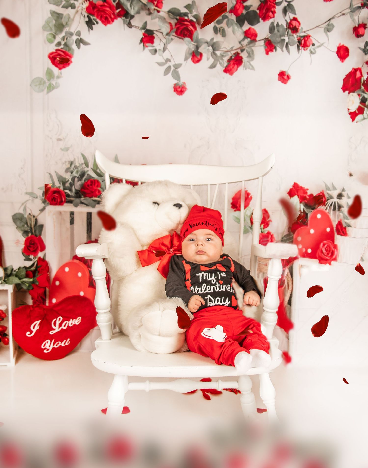 Valentine's day decorative scene with red roses, hearts, and romantic decor against a white background.