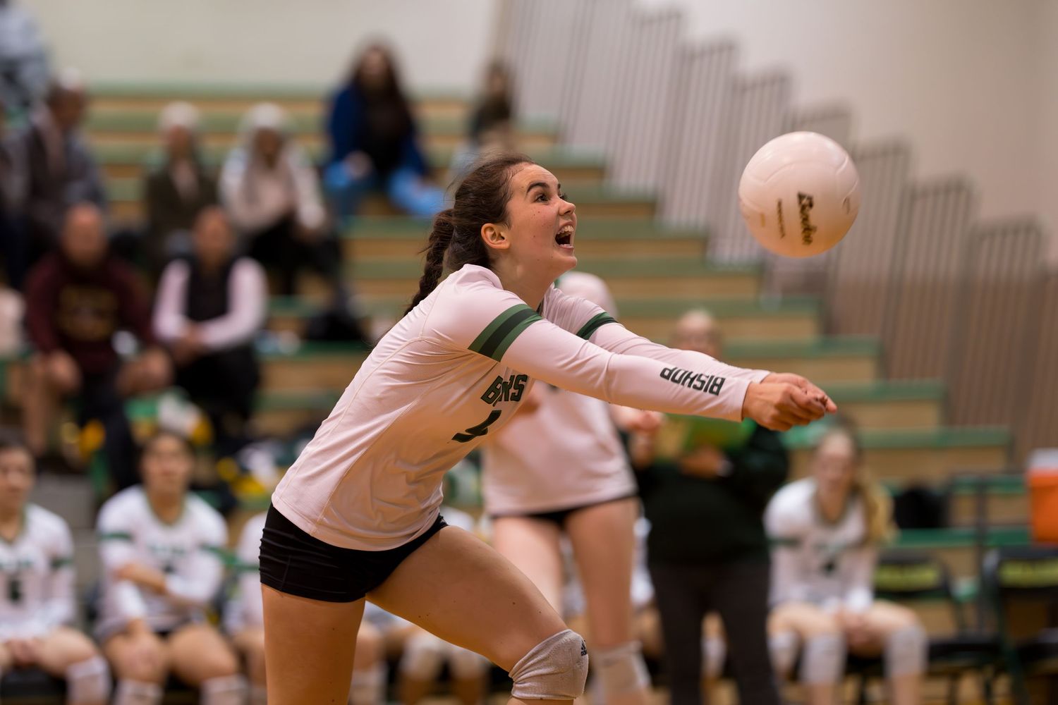 A volleyball player from Bishop Blanchet High School reaches out for the ball.