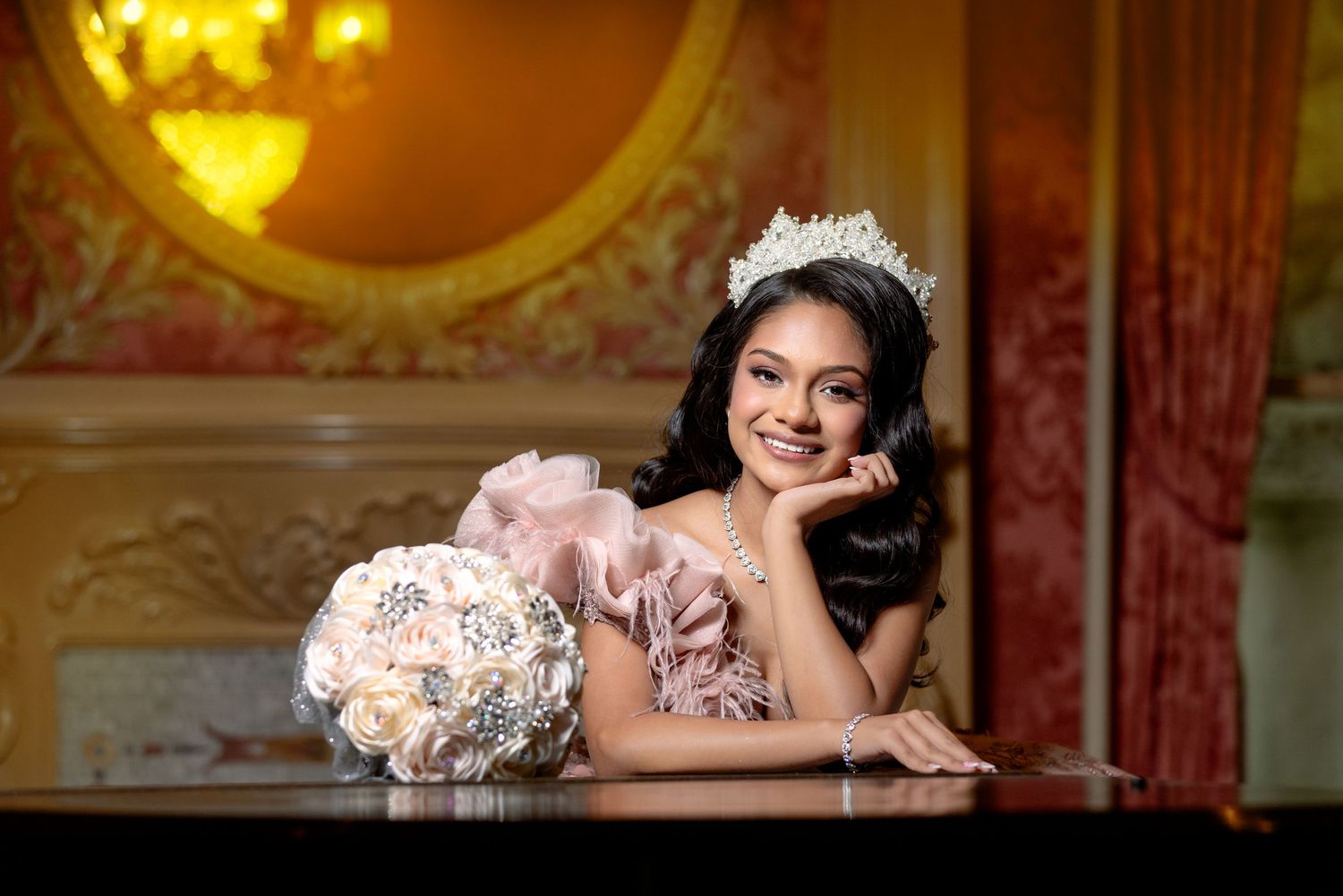 Elegant indoor photoshoot setup with warm golden lighting and luxurious decor.