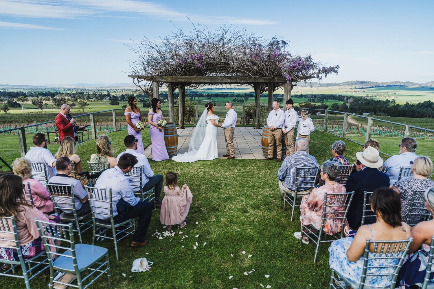 Newly married couple at Lovedale Chapel and Functions, by Adam West Wedding Photographer.
