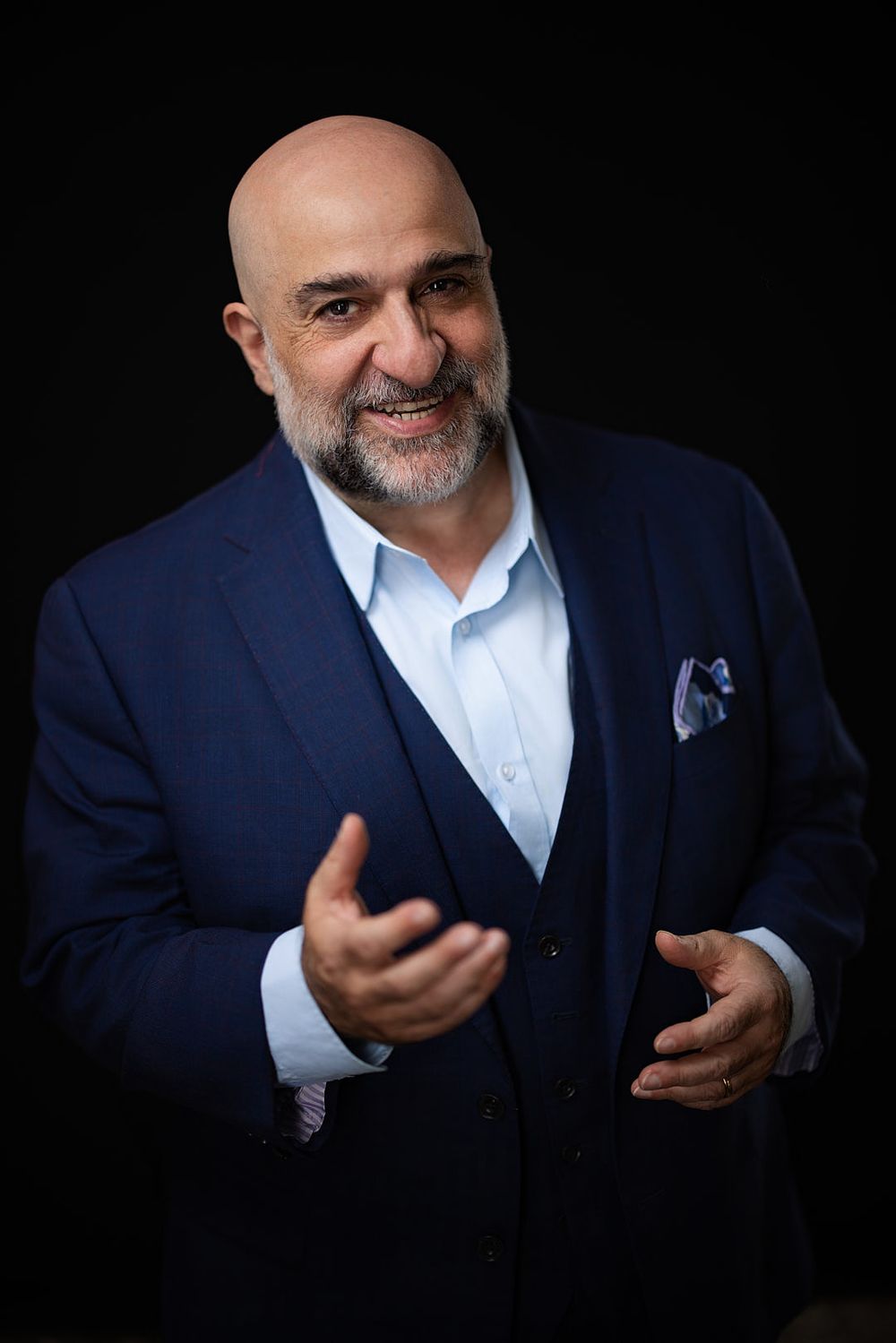 Omid Djalili with a welcoming expression on his face