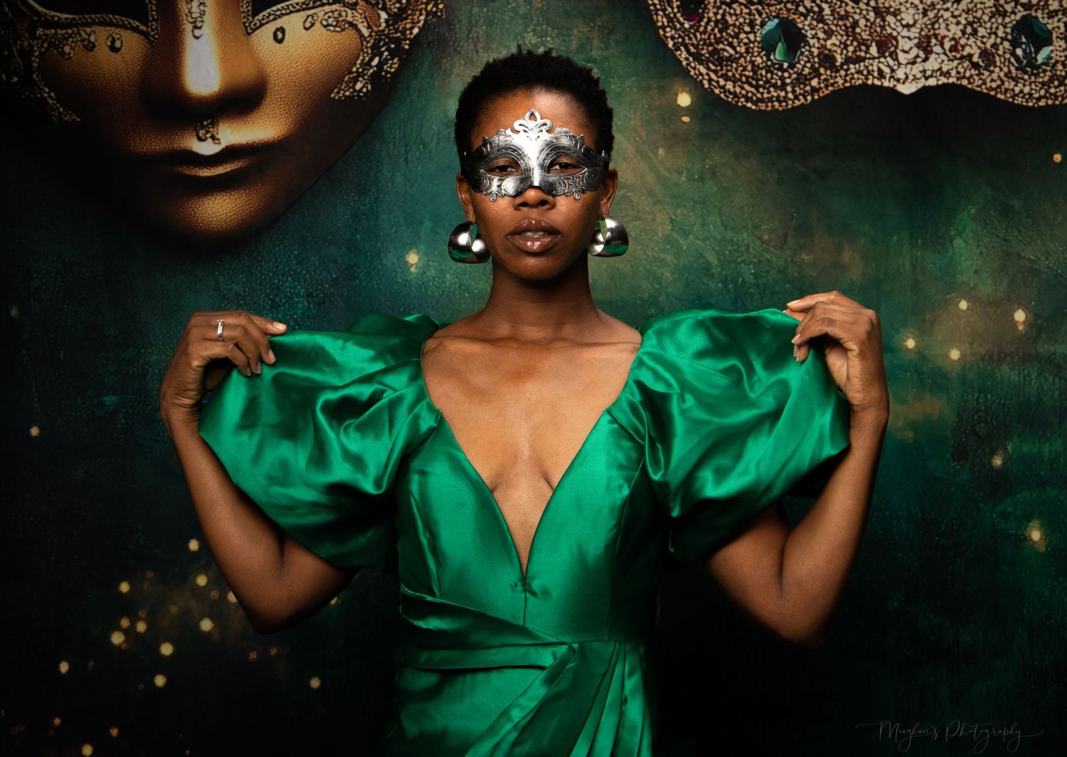 Studio portrait of a model dressed in Mardi Gras attire, captured by Meaghan Doggett Photography in Mobile, Alabama.