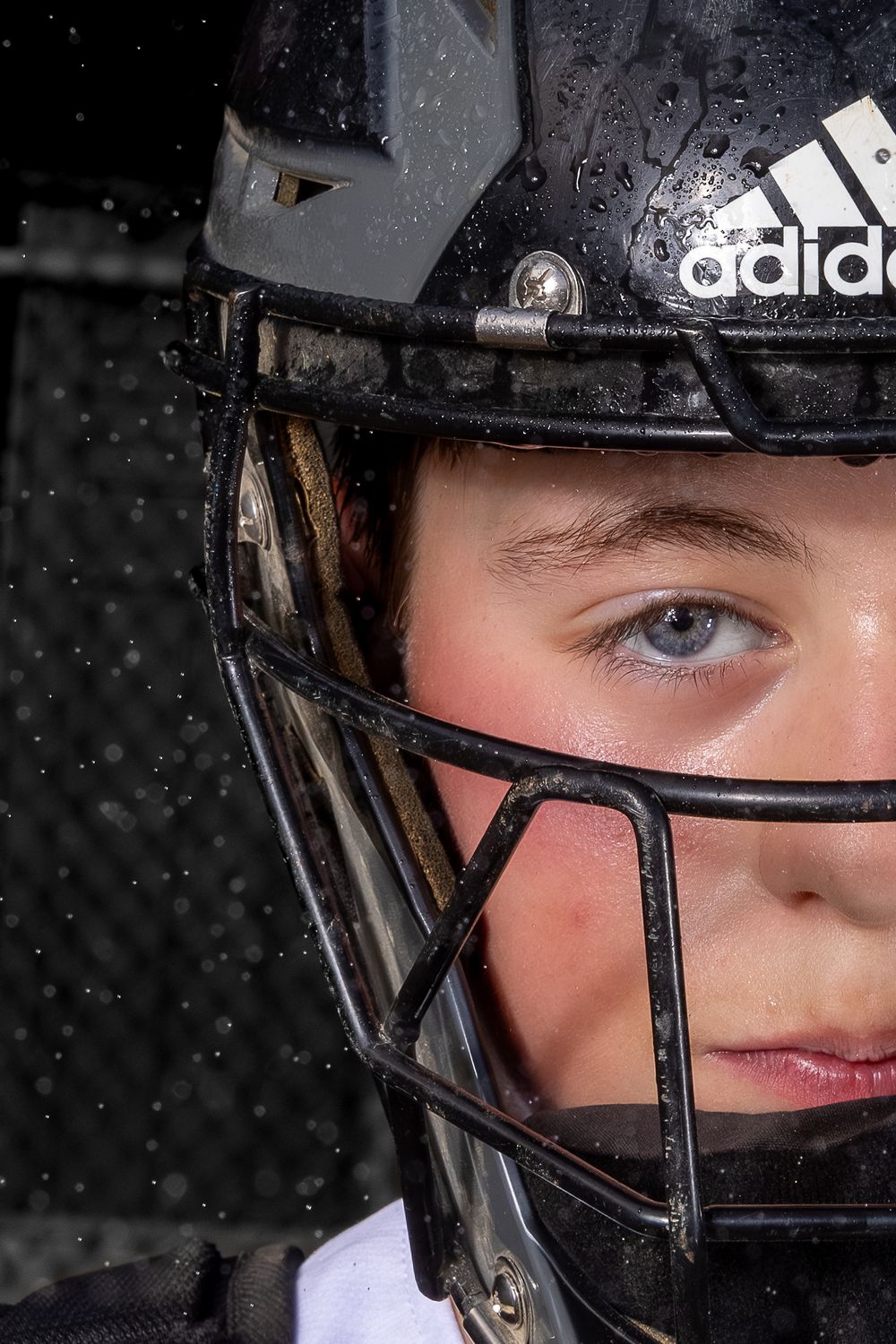 closeup portrait baseball catcher suzi gibson photography dramatic sportraits sport portraits senior baseball maryland dmv smoke fog