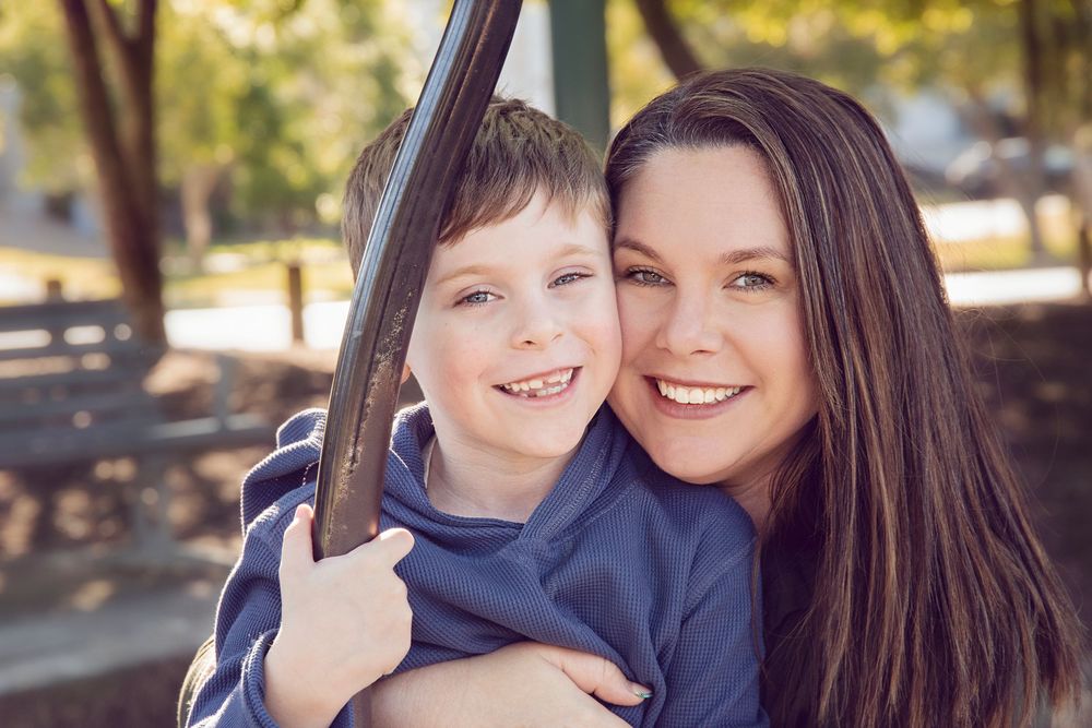 mum and her son in the park on the gold coast for their family photo shoot