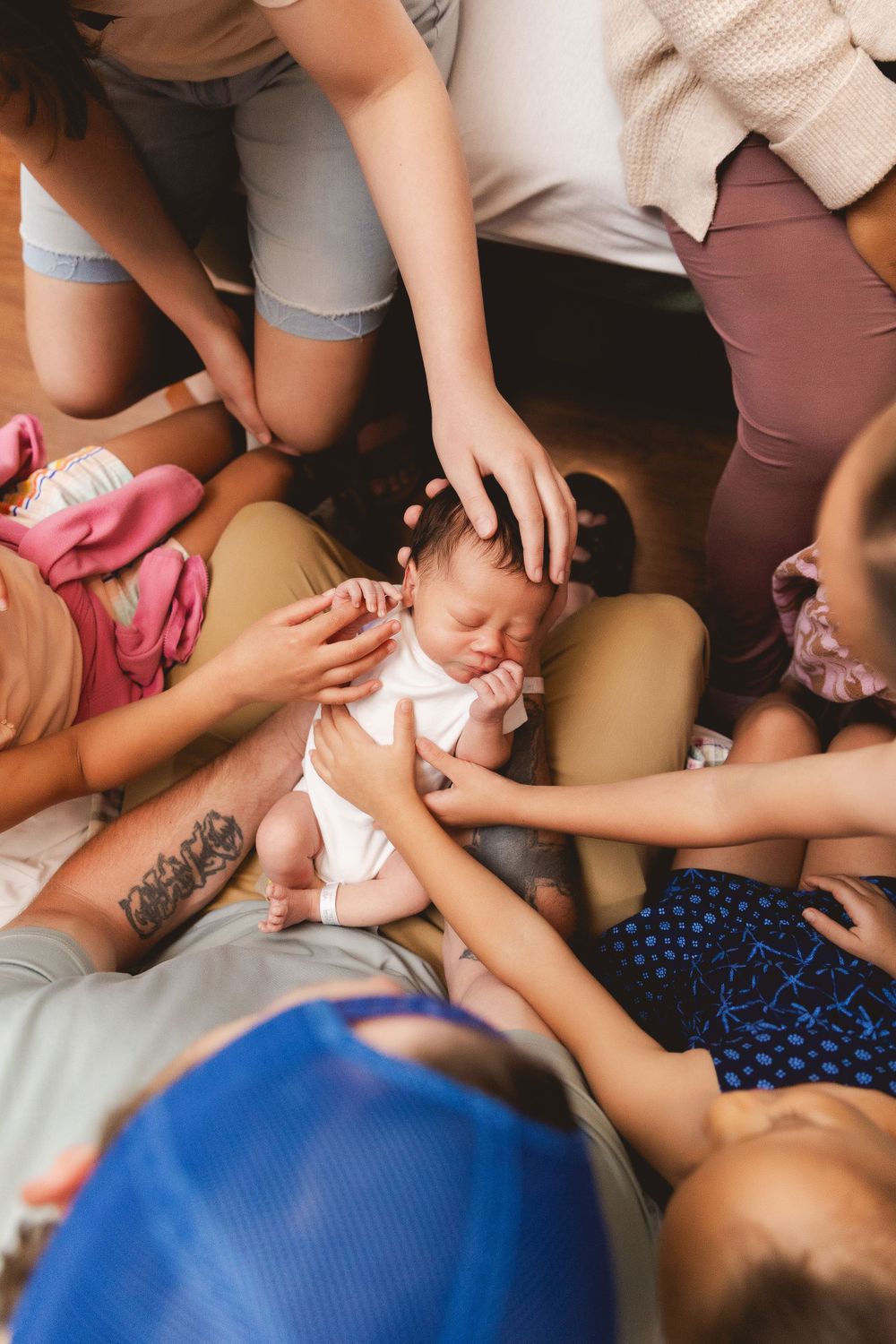 Fresh 48 photo of parents holding newborn baby boy in hospital, captured by Urso Photography.
