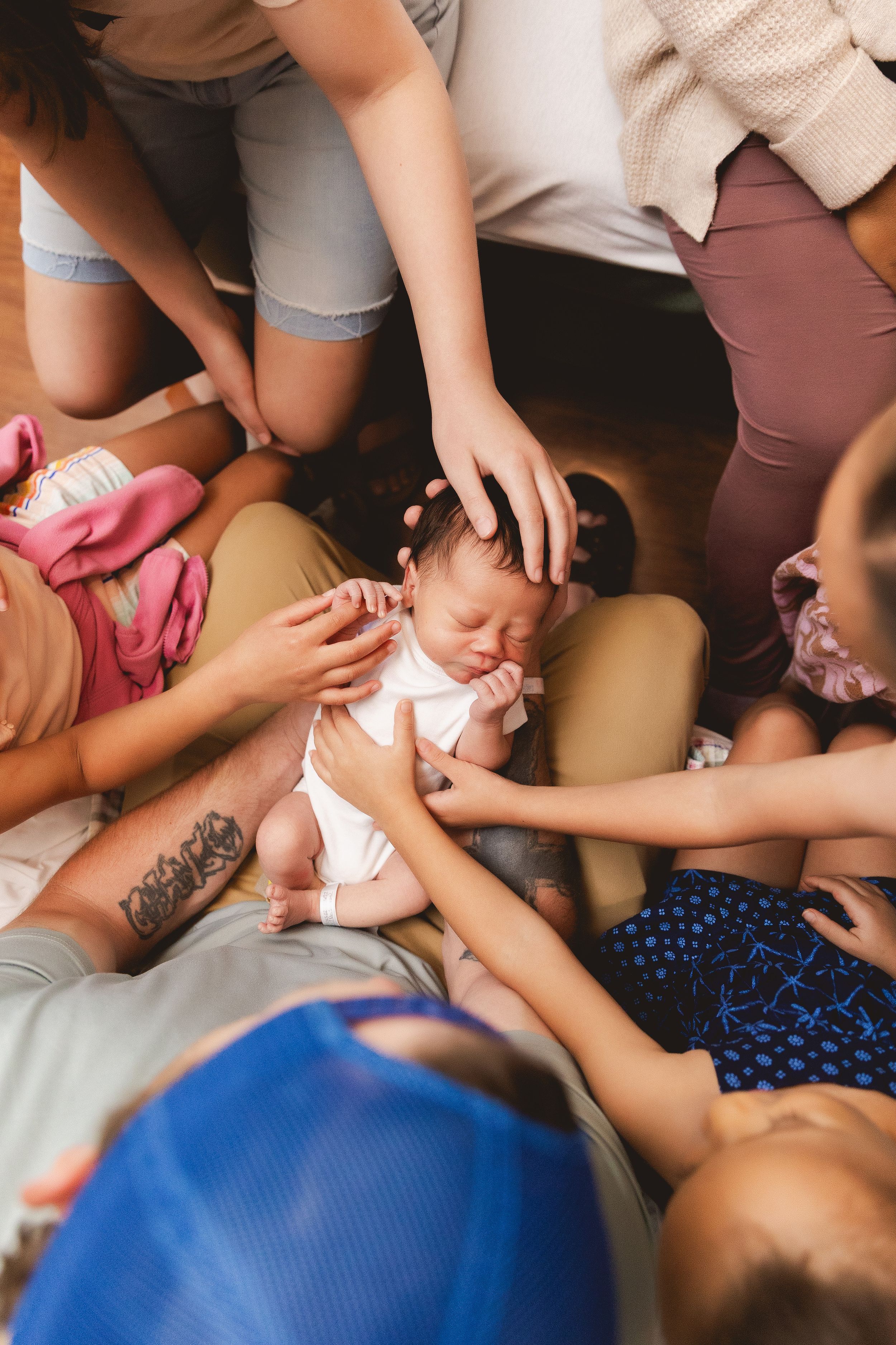 Fresh 48 photo of parents holding newborn baby boy in hospital, captured by Urso Photography.