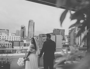 Urban skyline view with modern buildings and city architecture in black and white.