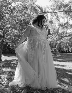 A series of black and white photos showing bridesmaids in flowing dresses walking through a tree-lined outdoor setting.