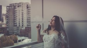 A person gazes thoughtfully through apartment windows in a series of connected urban lifestyle photographs.