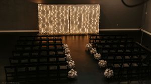 Decorative string lights hang from above creating a warm glowing ambiance.